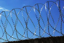 Concertina wire barrier